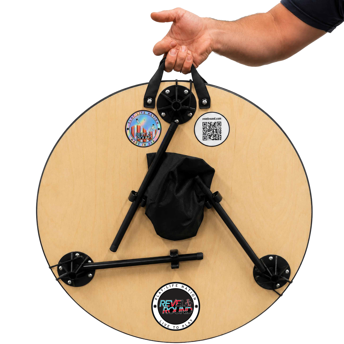 Both Revel Round boards packed together and held by the carry handles, with legs folded and bags stored.